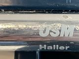 a close up of a car with a usm sticker on it