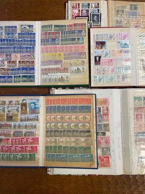 many different types of stamps on a table