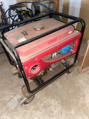 un petit générateur qui se trouve dans le garage