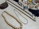 a table with a lot of jewelry on it