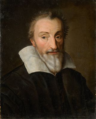 un tableau représentant un homme à la barbe blanche et vêtu d'une chemise noire