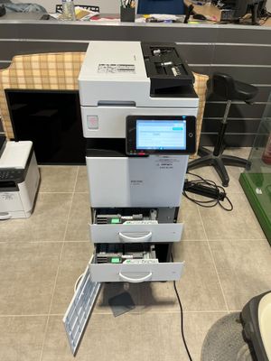a printer that is sitting on top of a table