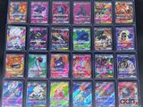 a close up of a collection of pokemon cards on a table