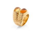 a close up of a ring with two rings on top of it