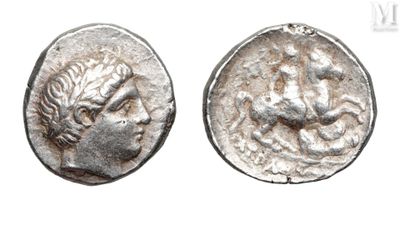 a close up of a coin with a face on it