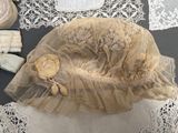 a hat with a teddy bear on it on a table