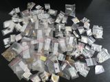 a pile of small packages on a black table