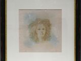 painting of a woman ' s face in a frame on a wall