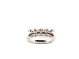 a close up of a diamond ring on a white background