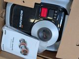 a box with a camera and other items inside of it