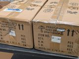 many boxes that are stacked up on a table