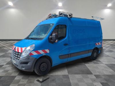 the blue van is parked on a checkered floor in the garage