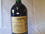 a bottle of wine that is sitting on a table