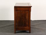 an image of a small wooden cabinet with a drawer