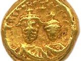 une pièce d'or portant l'image d'un homme et d'une femme