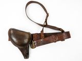 an old leather holster with a leather belt on a white background