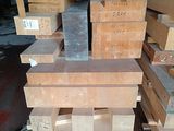 many pieces of wood stacked on top of each other