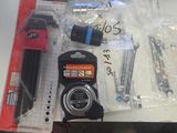 a lot of tools that are laying out on the table