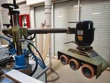 an image of a machine that is working on a piece of wood