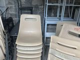 a lot of chairs that are sitting in a room