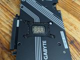 a close up of a hard drive sitting on top of a wooden table
