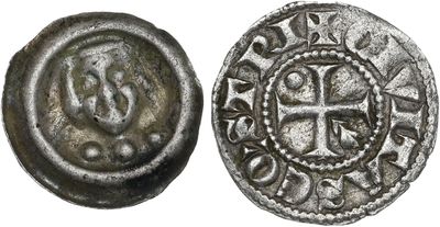 une pièce de monnaie en argent portant l'image d'une croix