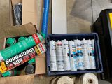 a box full of supplies sitting on the floor