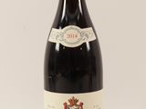 a close up of a bottle of wine on a white background