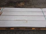a pallet with a pallet of wood and a pair of scissors on it