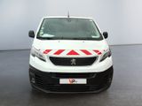 the front of a white van with a red and white stripe on it