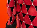 a close up of a red and black jacket with black accents