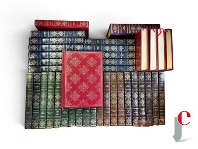 many books stacked on top of each other on a shelf