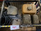 a metal cart with a lot of items in it