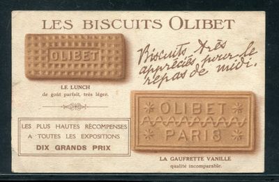 une vieille carte postale sur laquelle figure l'image d'un biscuit