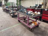 many different types of tools on a table in a warehouse