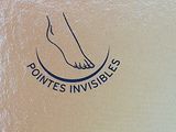 a box with a picture of a person ' s foot on it