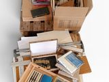 many boxes of books and other items sitting on the floor