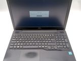 a laptop computer with a keyboard on a white table