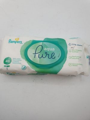a close up of a packet of baby wipes on a white surface