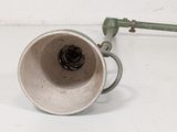 a white wall with a green pipe and a white wall with a green pipe and a white wall with a green pipe and a white wall with a green