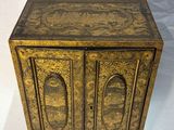 brass plated wooden cabinet with two doors and two drawers