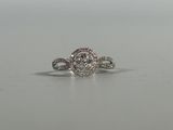 an image of a diamond ring on a table