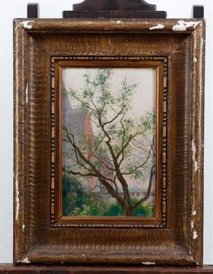 painting of a tree in a wooden frame on a shelf