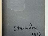 an open book with a drawing of a man ' s face on it