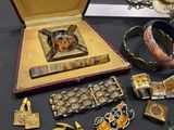 a lot of jewelry on display on a table