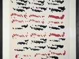 un tableau noir et rouge comportant des inscriptions, dans un cadre noir