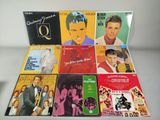 various elvis presley albums are arranged on a white surface