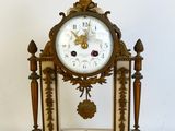 a clock that is sitting on top of a table