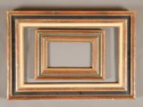 a close up of a picture frame with multiple colors of wood