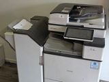 a photo of a printer sitting on top of a desk